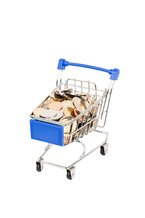Shopping cart full of coin on white backgroundの写真素材