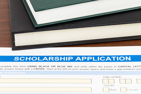 Scholarship application form with  text bookの写真素材
