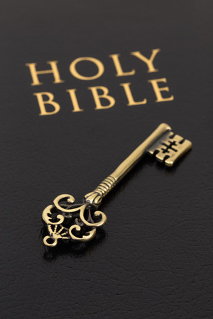 Holy bible and vintage key on cover concept theology studyの写真素材