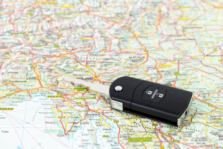 Car key on street map travel conceptの写真素材