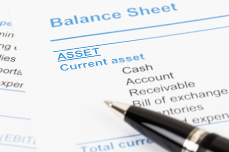 Asset in financial report book and pen, document is mock-upの写真素材
