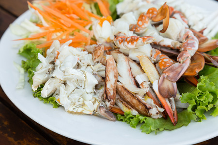 Steamed flower crab in white dishの写真素材