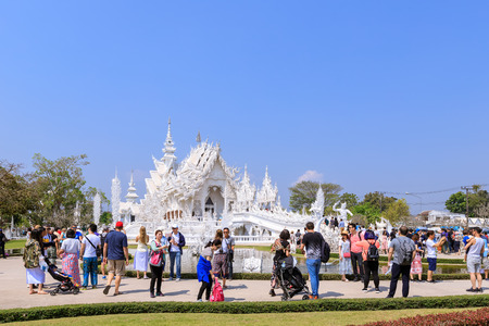 Chiang Rai, Thailand - February 20, 2018: Wat Rong Khun or White Temple, world famous destination. Designed by Master Chalermchai Kositpipat, National artist.のeditorial素材