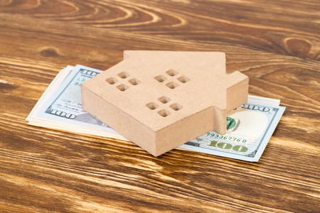 Model house on dollar money banknote concept for mortgageの写真素材