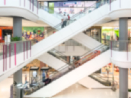 Abstract blurred shopping mall department store interior for background