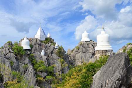 Floating pagoda on peak of mountain at Wat Chaloem Phra Kiat (Phra Bat Pupha Daeng) temple in Chae Hom district, Lampang, Thailandの写真素材