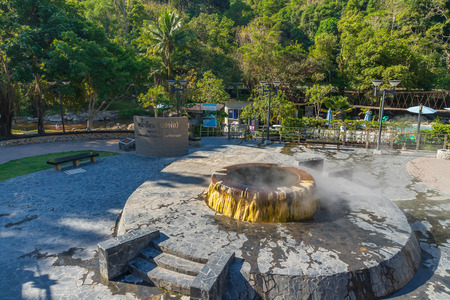 Ranong, Thailand - February 19, 2019: Famous hot spring well in Raksa Warin public park.のeditorial素材