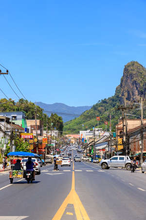 Phang-Nga, Thailand - February 22, 2019: Traffic on main street in Phang-Nga town, near Phuket.
