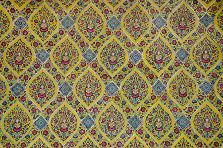 Colorful Detail of Ancient Color Ceramic Wall In Classic Thai Art Style.の写真素材