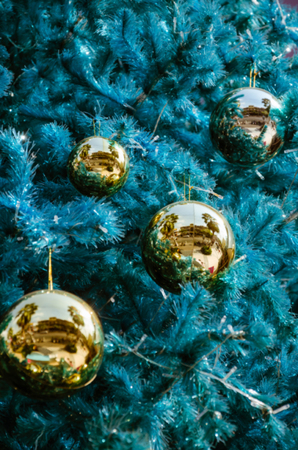Christmas Tree and Golden Balls Ornament In Blurry Background.の写真素材