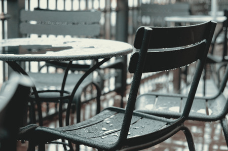 Table and Chair of Coffee Cafe Is Outdoor In The Rainny Season.
