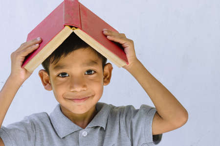 Asian Child Feel Happy with a Book.の写真素材