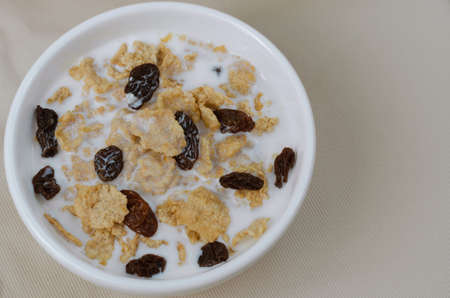 Cereal and Raisin with Milk for Breakfast Meal.の写真素材