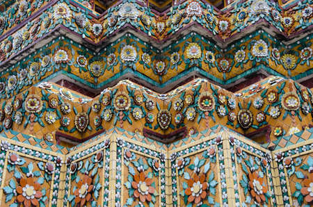 Thai Ornamental Pattern in Traditional Style is Decorated with Colorful Ceramic at Stupa of Wat Pho Monastery at Bangkok, Thailand.の写真素材