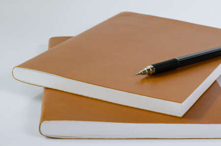 Leather Cover Notebooks on White Background.の写真素材