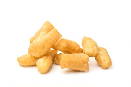 patongko fried crispy yellow breakfast On a white backgroundの写真素材