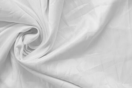 Beautiful white fabric is suitable for making backgrounds in various concept designs in the top view.の写真素材