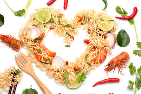 Heart-shaped seasoned noodles with shrimp lemon lemongrass onion coriander spring onion chili spicy...