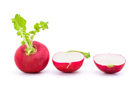 Fresh from the garden red radishes and radishes cut in half. isolated on a white backgroundの写真素材
