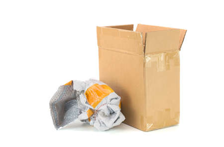 An old cardboard box that has been used. cut or separated on a white background an empty parcel box