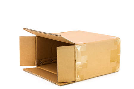 An old cardboard box that has been used. cut or separated on a white background an empty parcel box