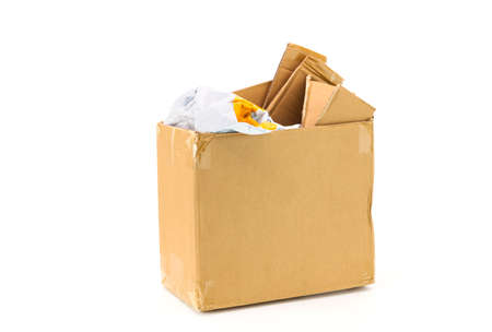 An old cardboard box that has been used. cut or separated on a white background an empty parcel box