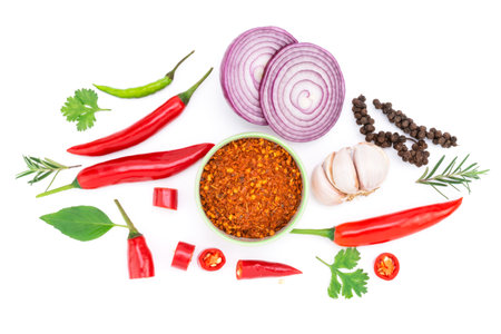 Composition of various herbs and spices vegetables rosemary pepper onion, garlic, fresh red chili, and garden mix for healthy food. isolated on white background, top viewの写真素材