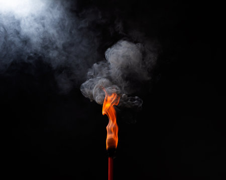 fire torch yellow-red flame fuel png abstract design isolated on a black backgroundの写真素材