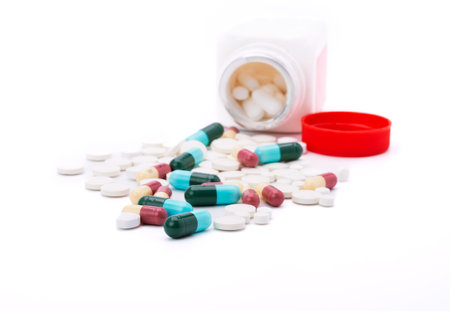 colorful pills with capsules and pills Medicine bottles isolated on white background Hospital Pharmacy Dispensing Concept Pharmacies and clinics health careの写真素材