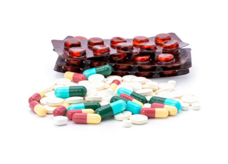 Colorful pills with capsules isolated on white background.の写真素材