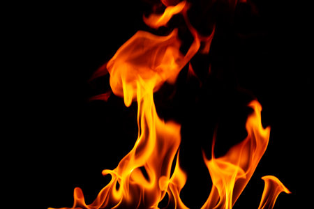 flame fuel png heat and burning hazard explode barbecue red yellow flame isolated on black backgroundの写真素材