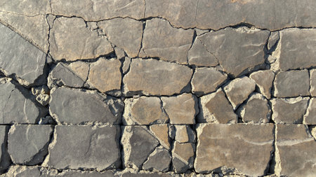 Cracked concrete floor or wall abstract background image cement stone building structureの写真素材