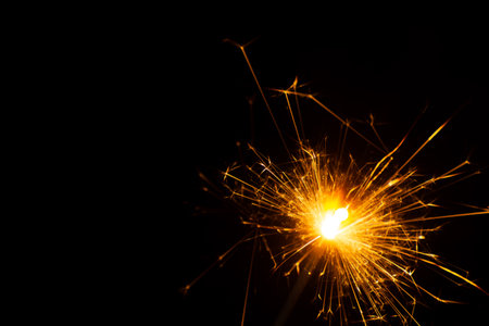 yellow fireworks sparks celebrate the new year Christmas holiday festival party festive night...
