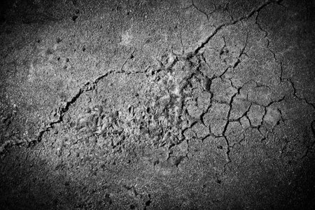 Grunge concrete cement wall with crack in industrial building, great for your design and texture backgroundの写真素材