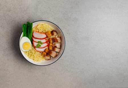 Pork noodles with pork, barbecue eggs, crispy pork, dumplings, green vegetables, healthy food, Thai,...