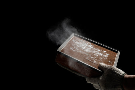 Dust or mold accumulates from the car air filter. Automotive industry technicians inspect and clean car air conditioners.の写真素材