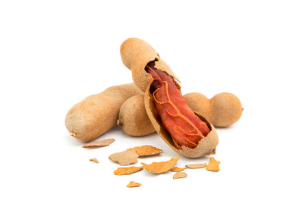 Tamarind has a sweet taste. or sour fruit, healthy natural food, isolated on white backgroundの写真素材