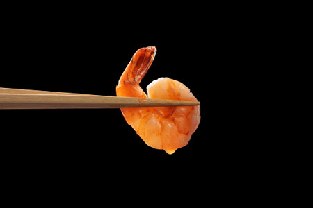 Fresh delicious seafood shrimp, separated on black background.の写真素材