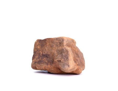 Natural rocks, black rough mountain rocks, red hard rocks for construction work on white background.の写真素材