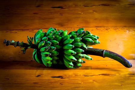 Banana still life. on wood backgroundの写真素材