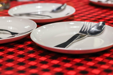 Dishes on the table. Red cloth.の写真素材
