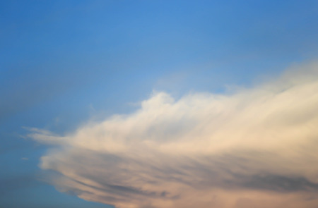 Partly Cloudy and light of sunset.の写真素材