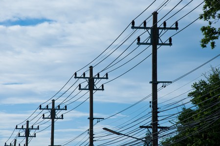 Electric tower on a blue sky background.の写真素材