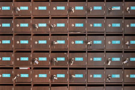 Wooden post boxes with room number and keysの写真素材