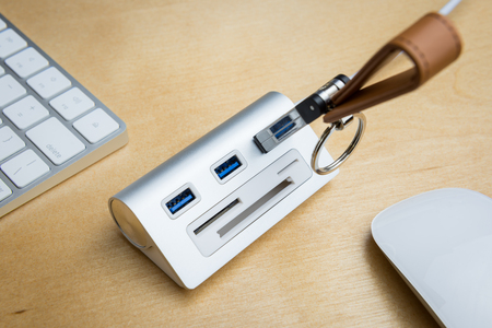 silver usb 3.0 extender with universal memory card slots hub, SD card, mini SD card, CF cardの写真素材