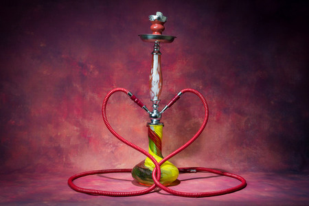 still life smoking shisha with heart shape double hose