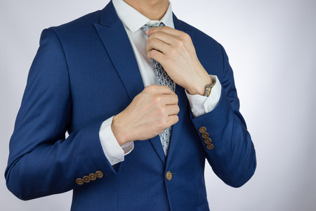 businessman fitting up blue suit and necktieの写真素材