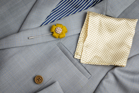 grey plaid texture double breasted suit, brown wood buttonsの写真素材