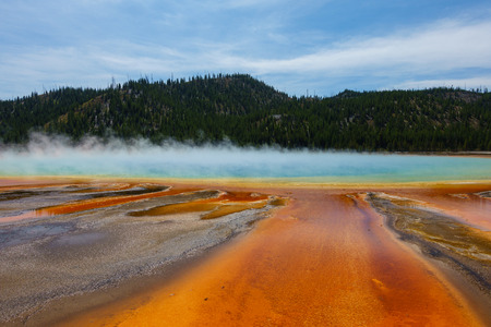 Famous trail of Grand Prismatic Springs in Yellowstone National Park. Beautiful  hot springs with vivid color in Wyoming.の写真素材