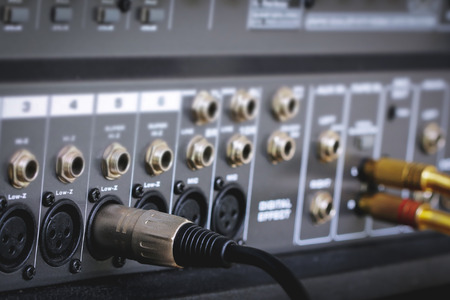 Neutrik plugs - Jack Connector XLR connectors on the amplifier on background blur.の写真素材